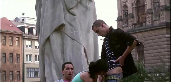  Young cute teen girl public street sex gang bang threesome by a famous statue